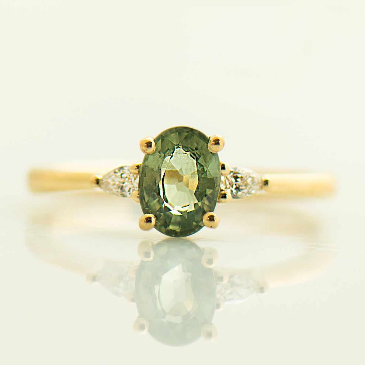 Floating Green Sapphire Engagement Ring - Oval