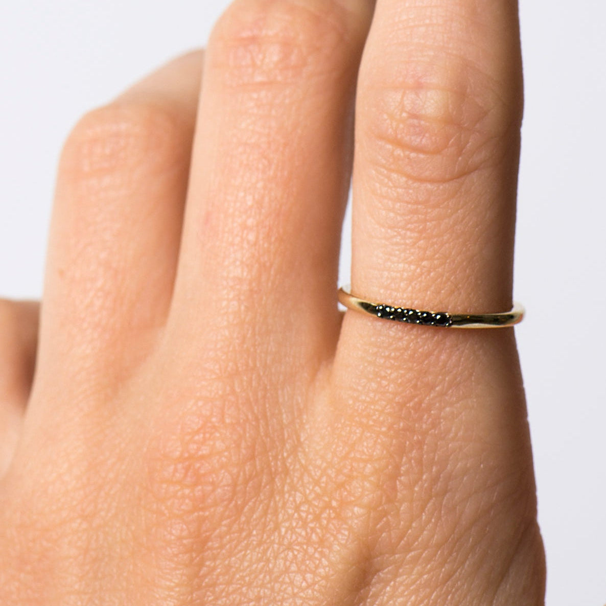 1.5 mm Black Diamond 5 Stone Ring