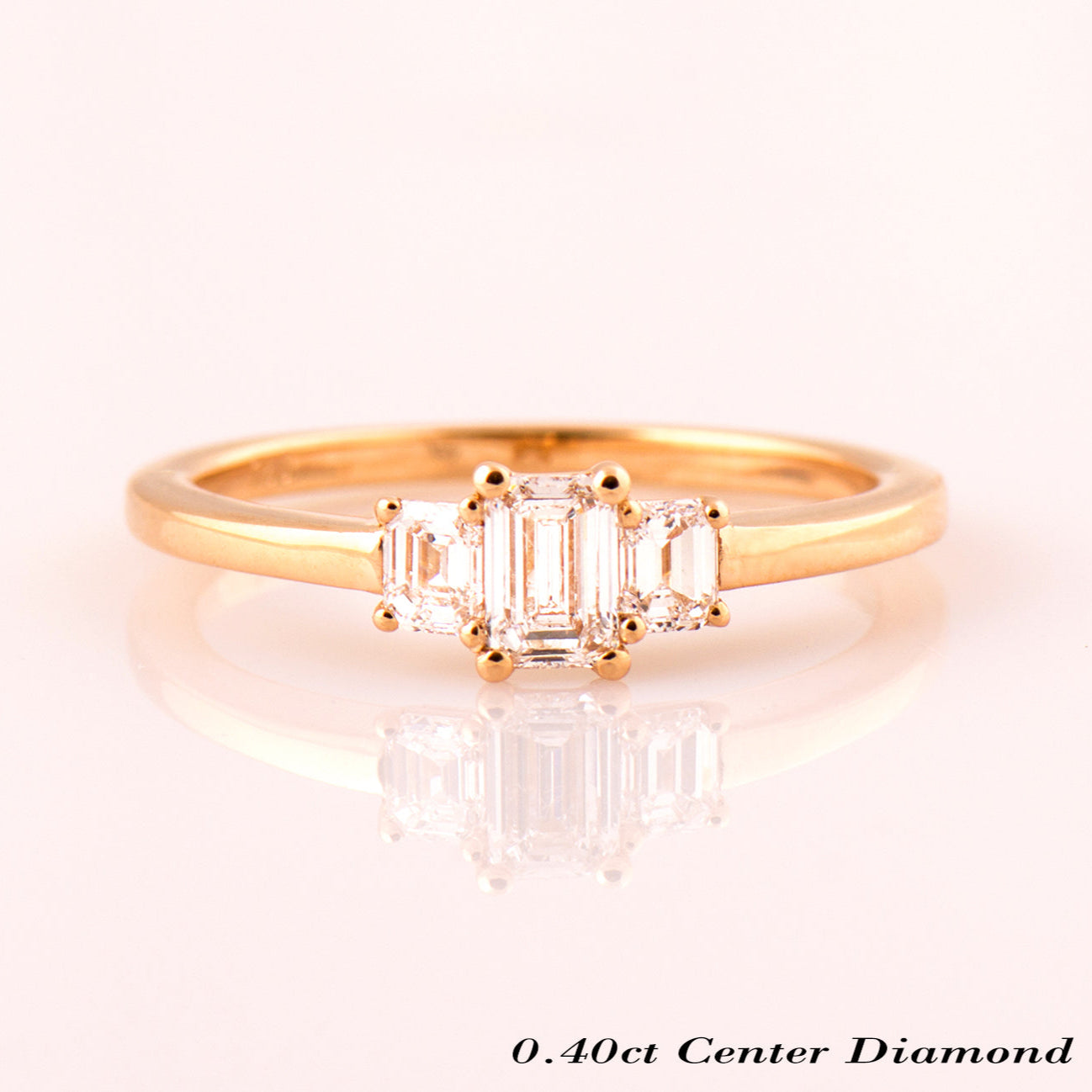 The 3 Stone Ring - Emerald Cut