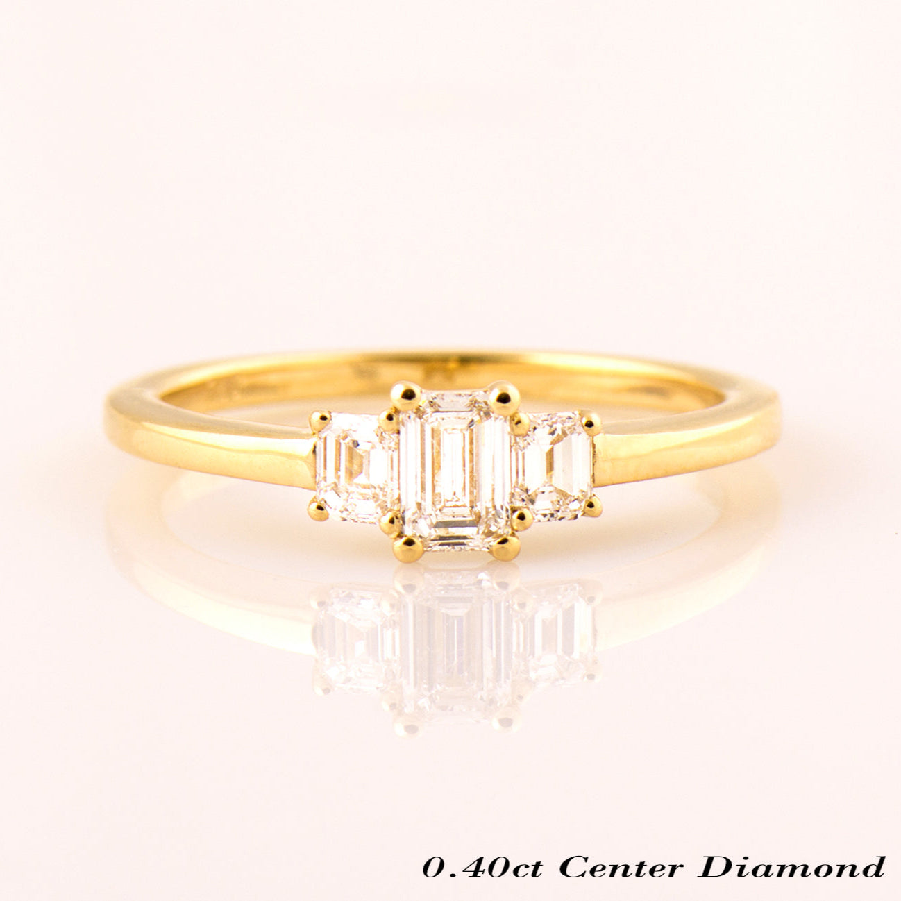 The 3 Stone Ring - Emerald Cut