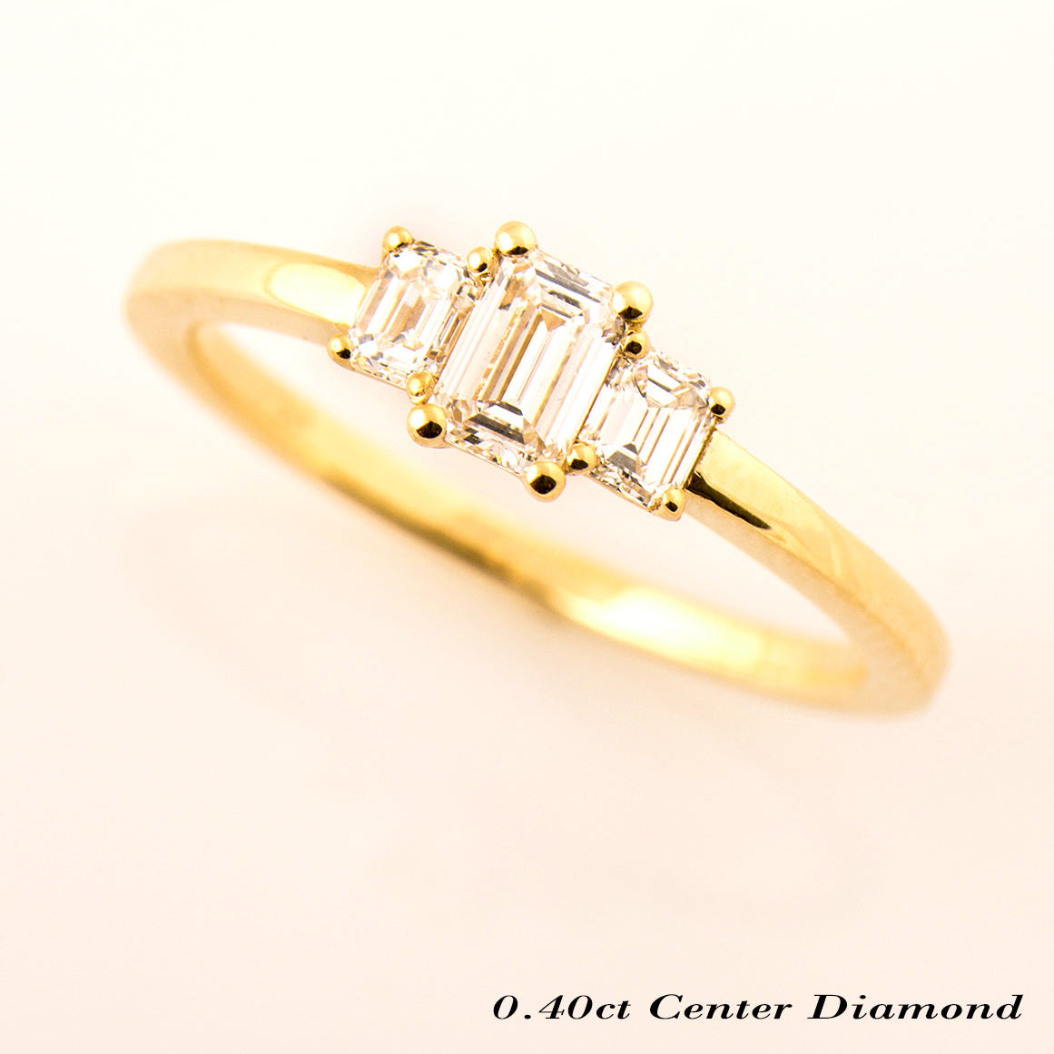 The 3 Stone Ring - Emerald Cut