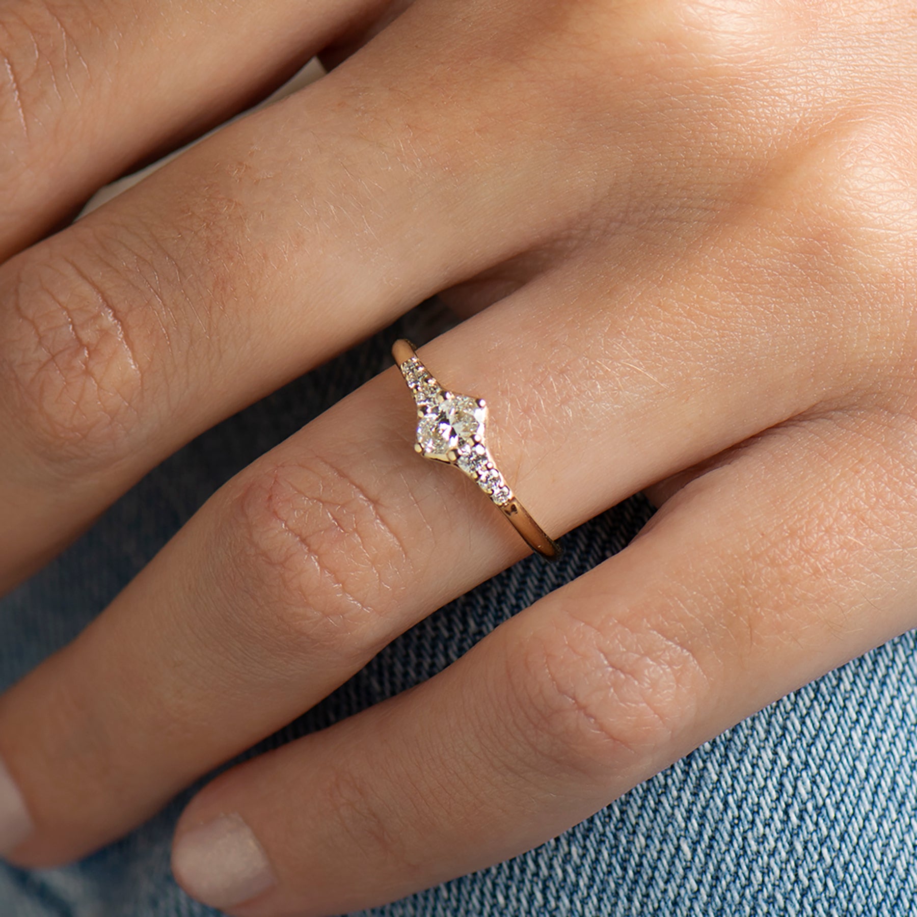 Tapered tiny oval diamond ring