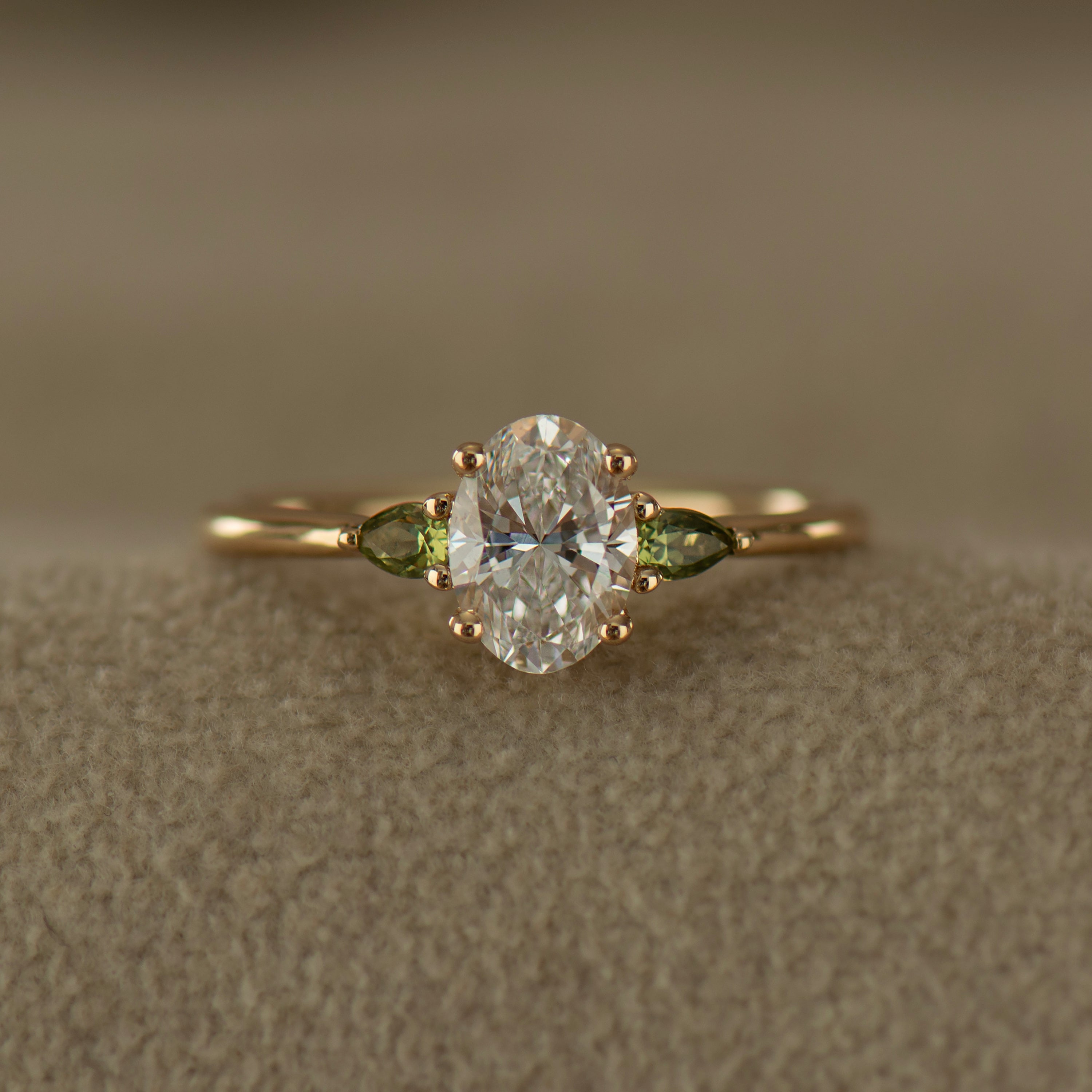 Oval Diamond And Green Sapphire Ring