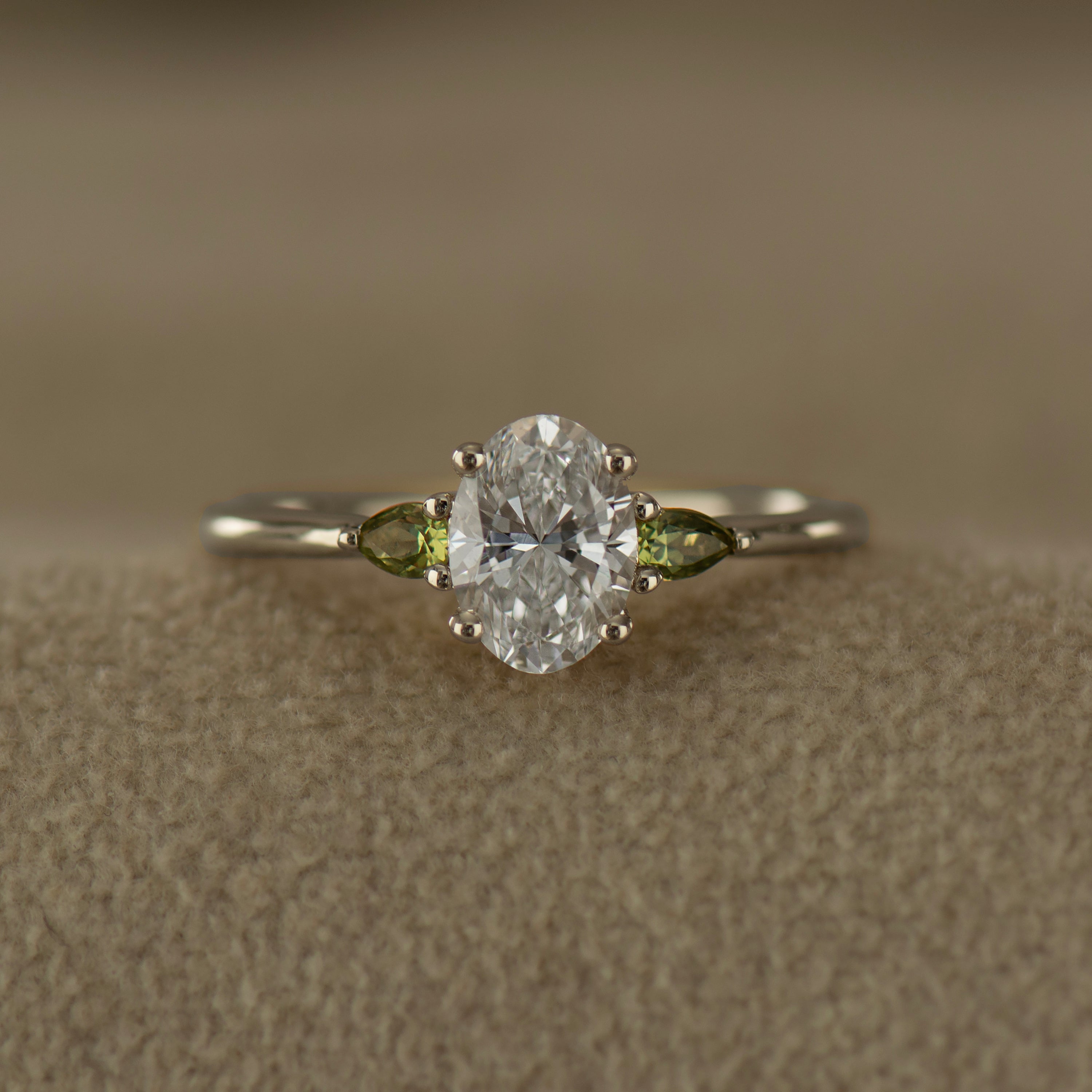 Oval Diamond And Green Sapphire Ring