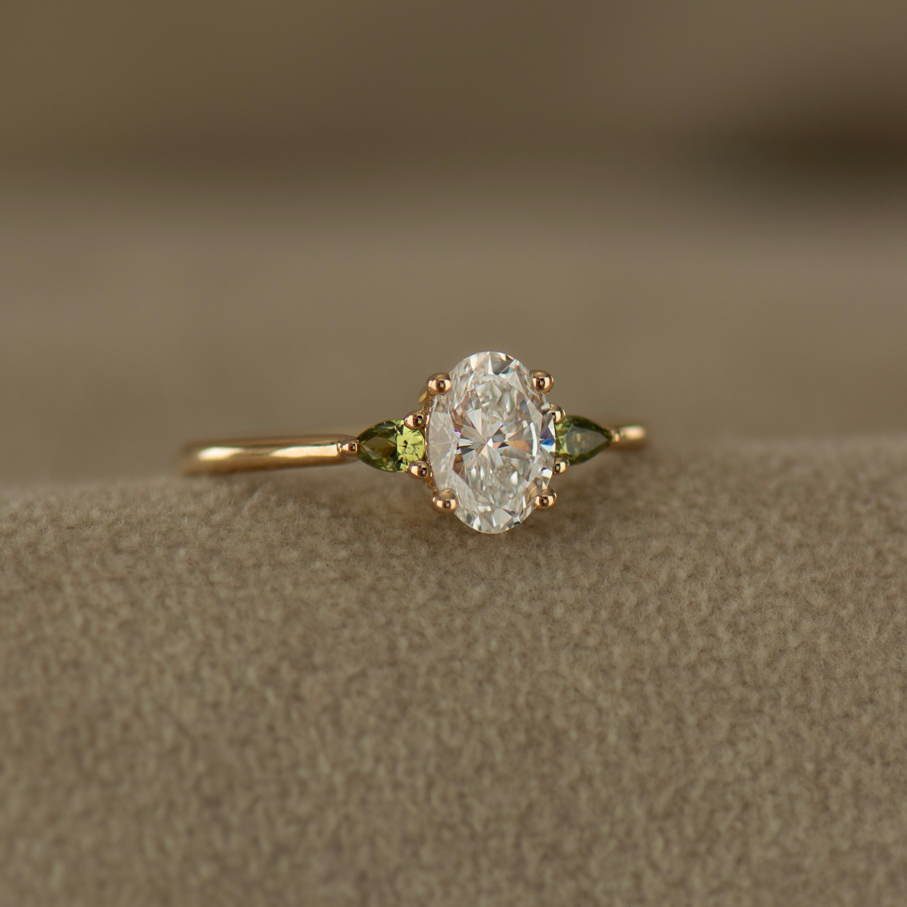 Oval Diamond And Green Sapphire Ring