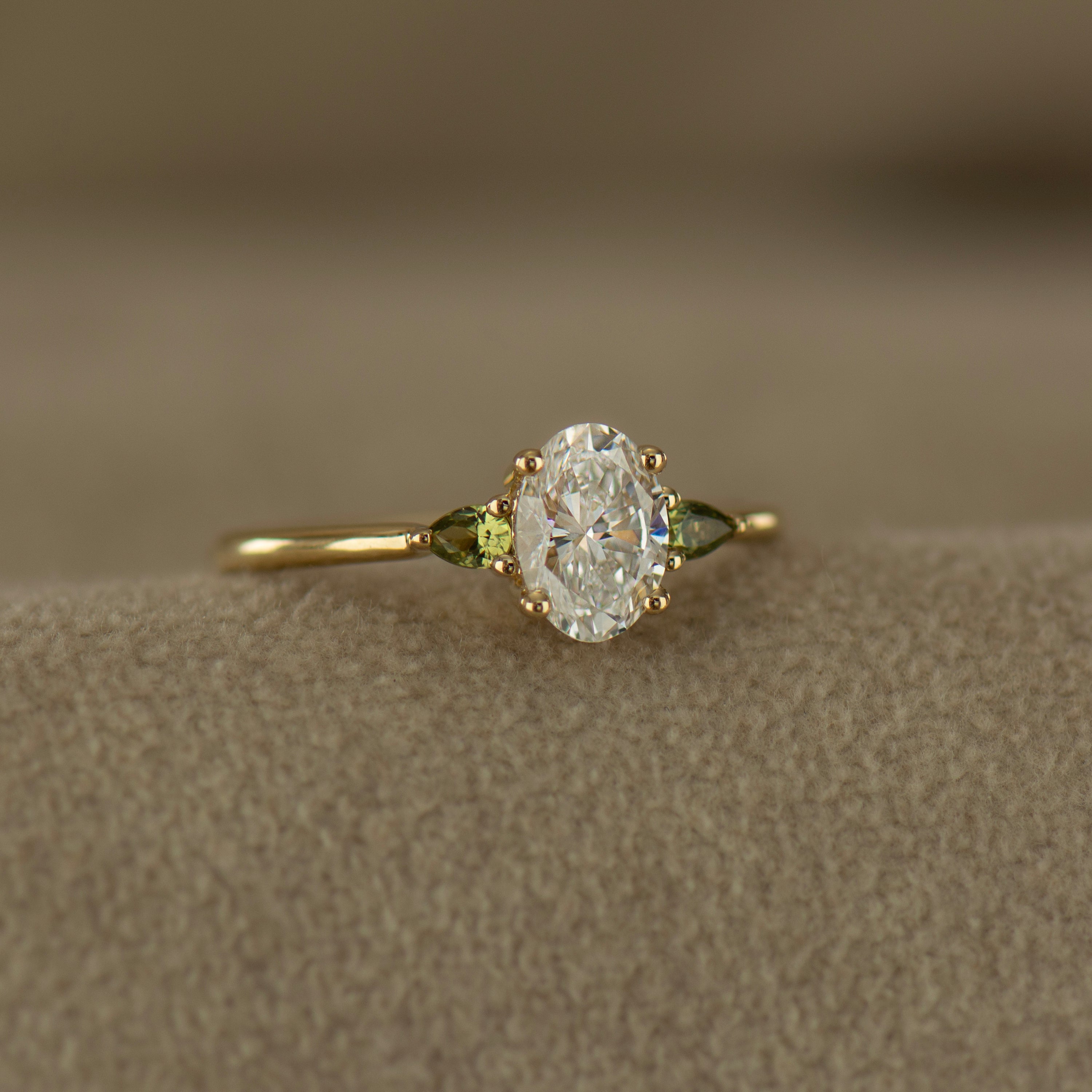 Oval Diamond And Green Sapphire Ring