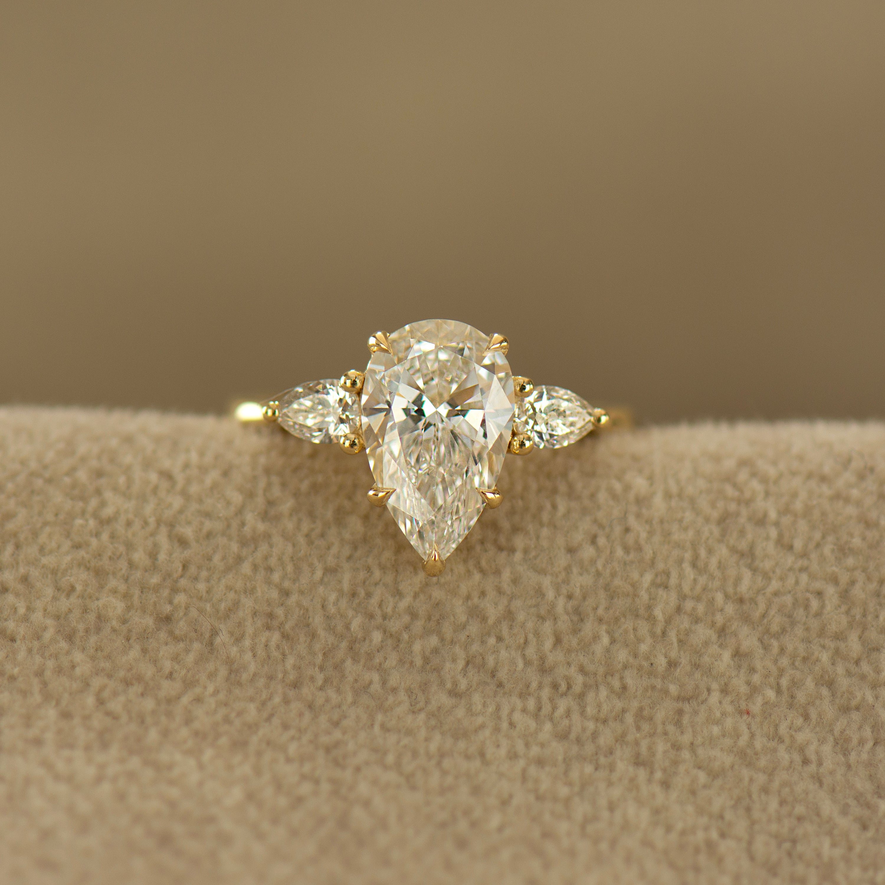 Three Stone Pear Ring