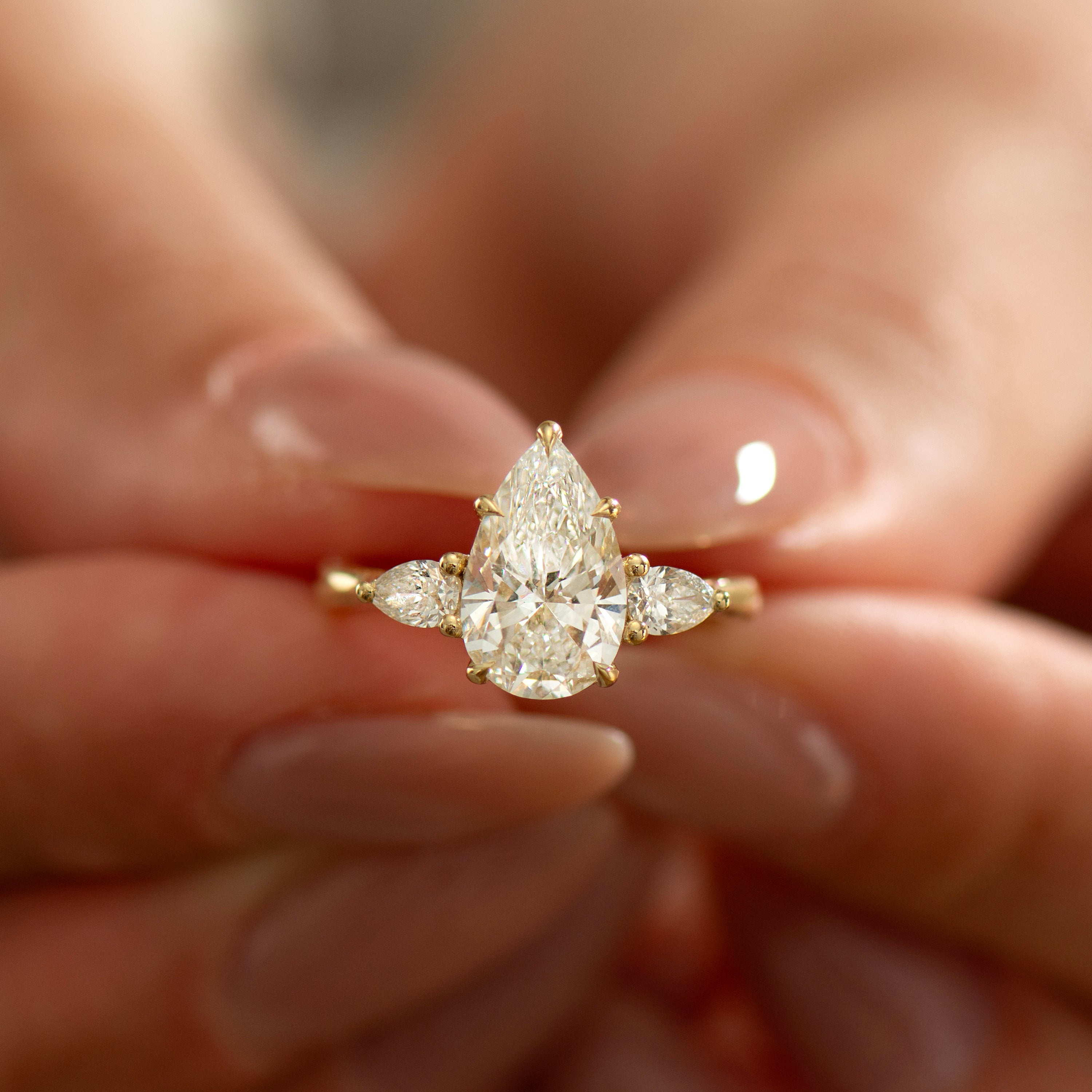 Three Stone Pear Ring