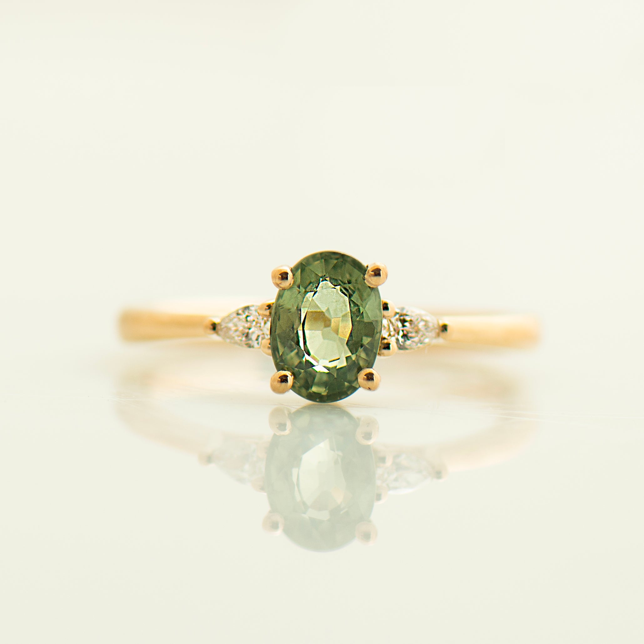 Floating Green Sapphire Engagement Ring - Oval