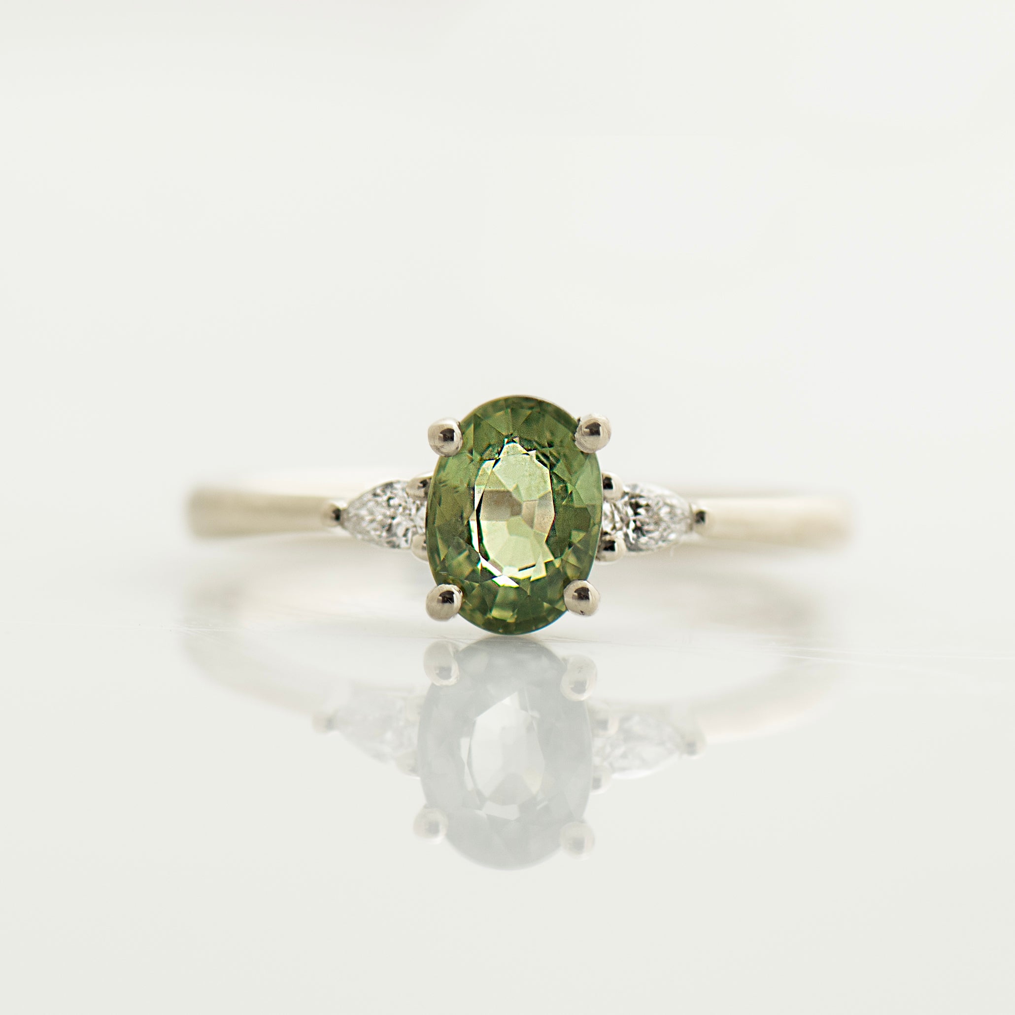 Floating Green Sapphire Engagement Ring - Oval