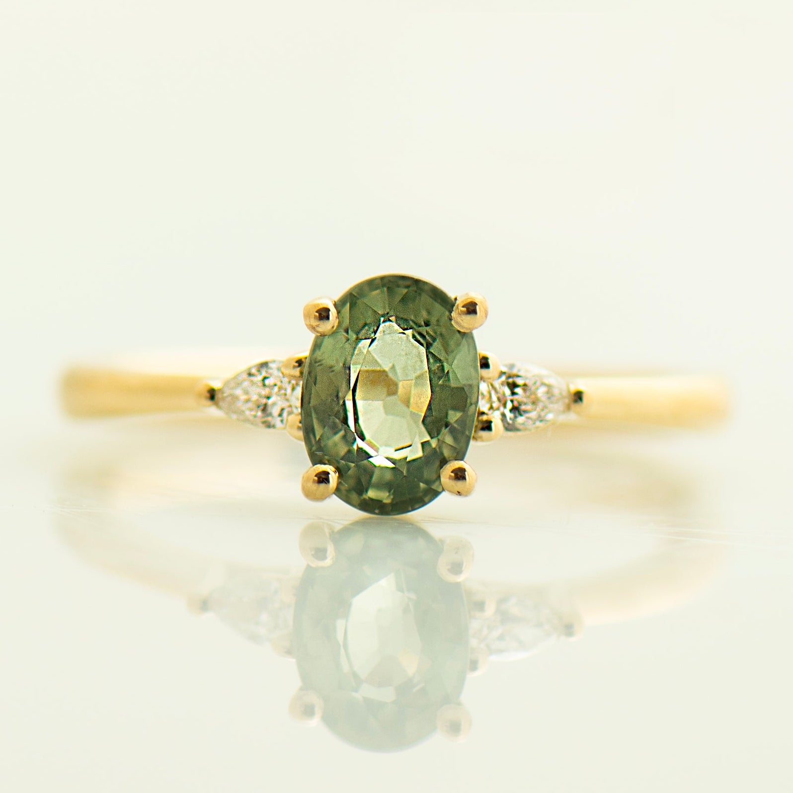 Floating Green Sapphire Engagement Ring - Oval