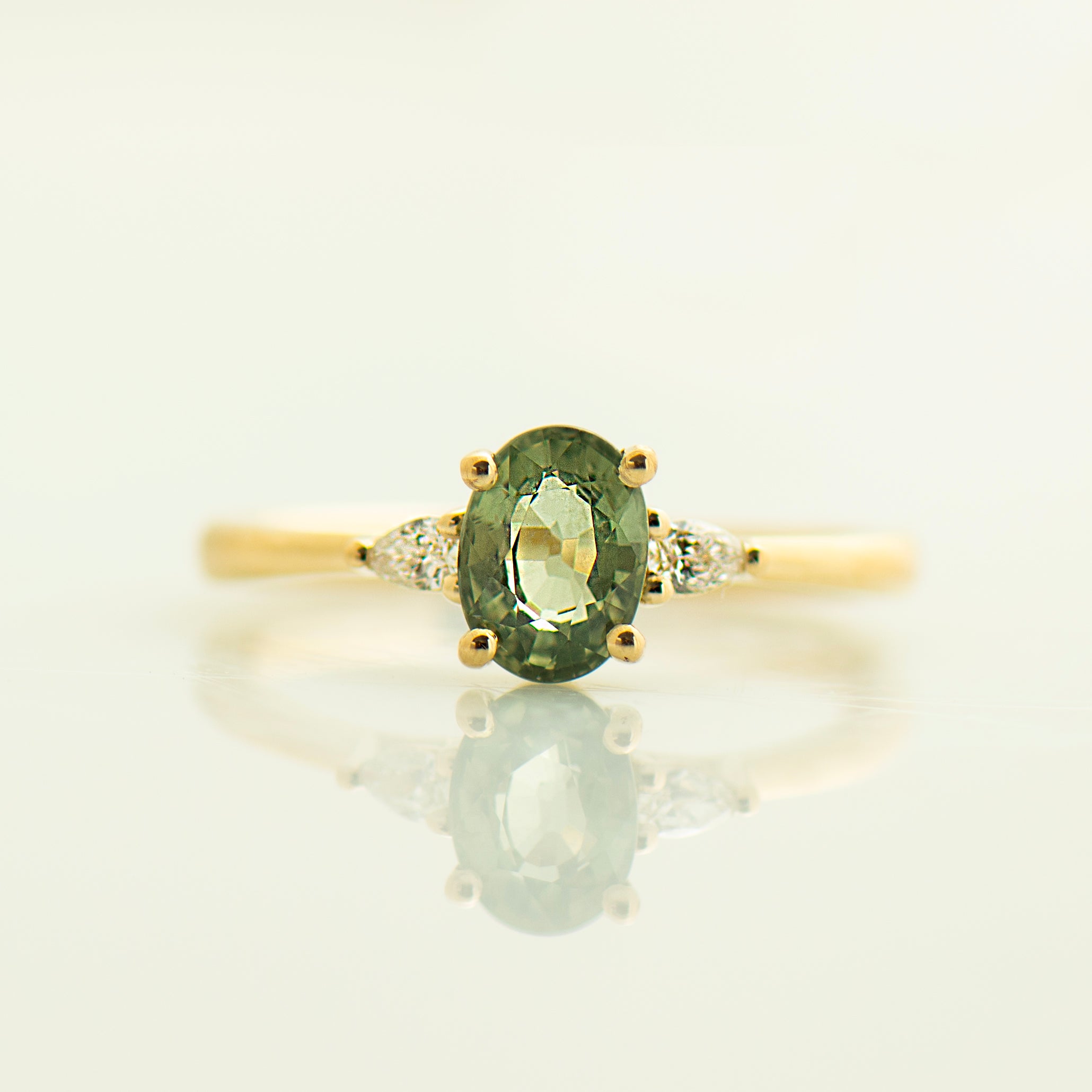 Floating Green Sapphire Engagement Ring - Oval