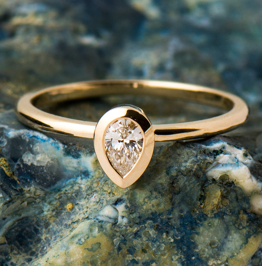 0.20 Carat Pear Cut Diamond Ring - 14K Yellow Gold
