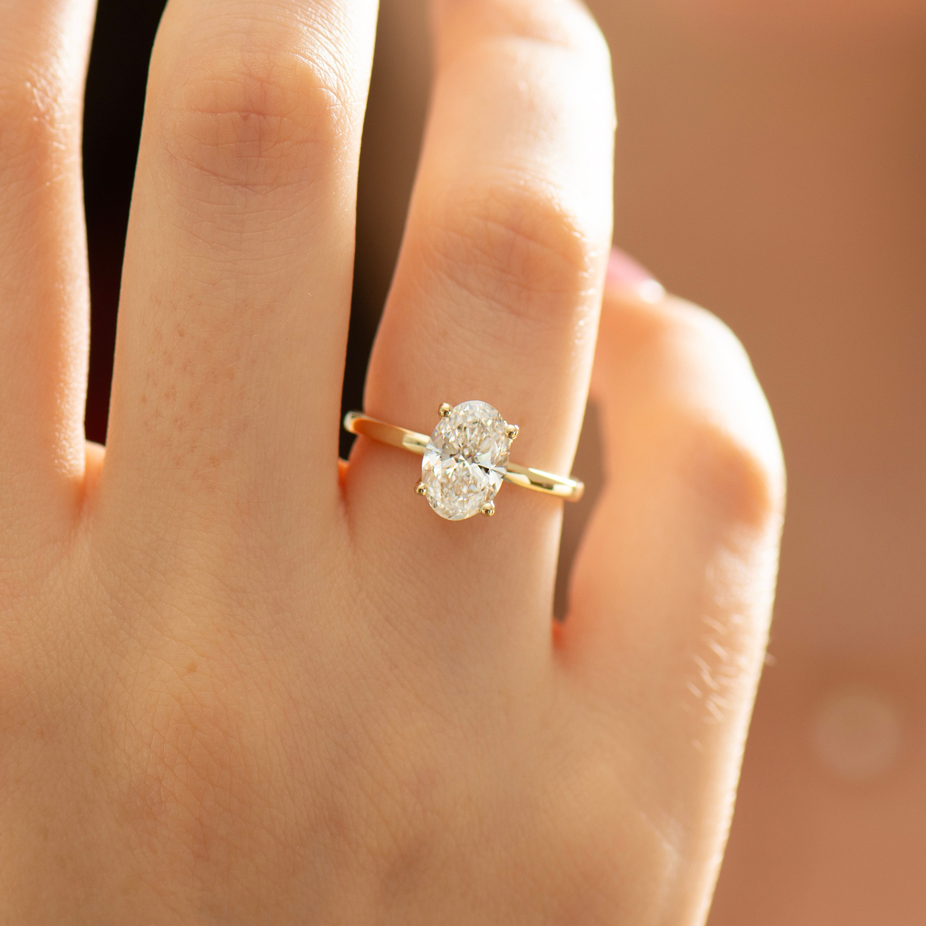 Hidden Halo Oval Engagement Ring