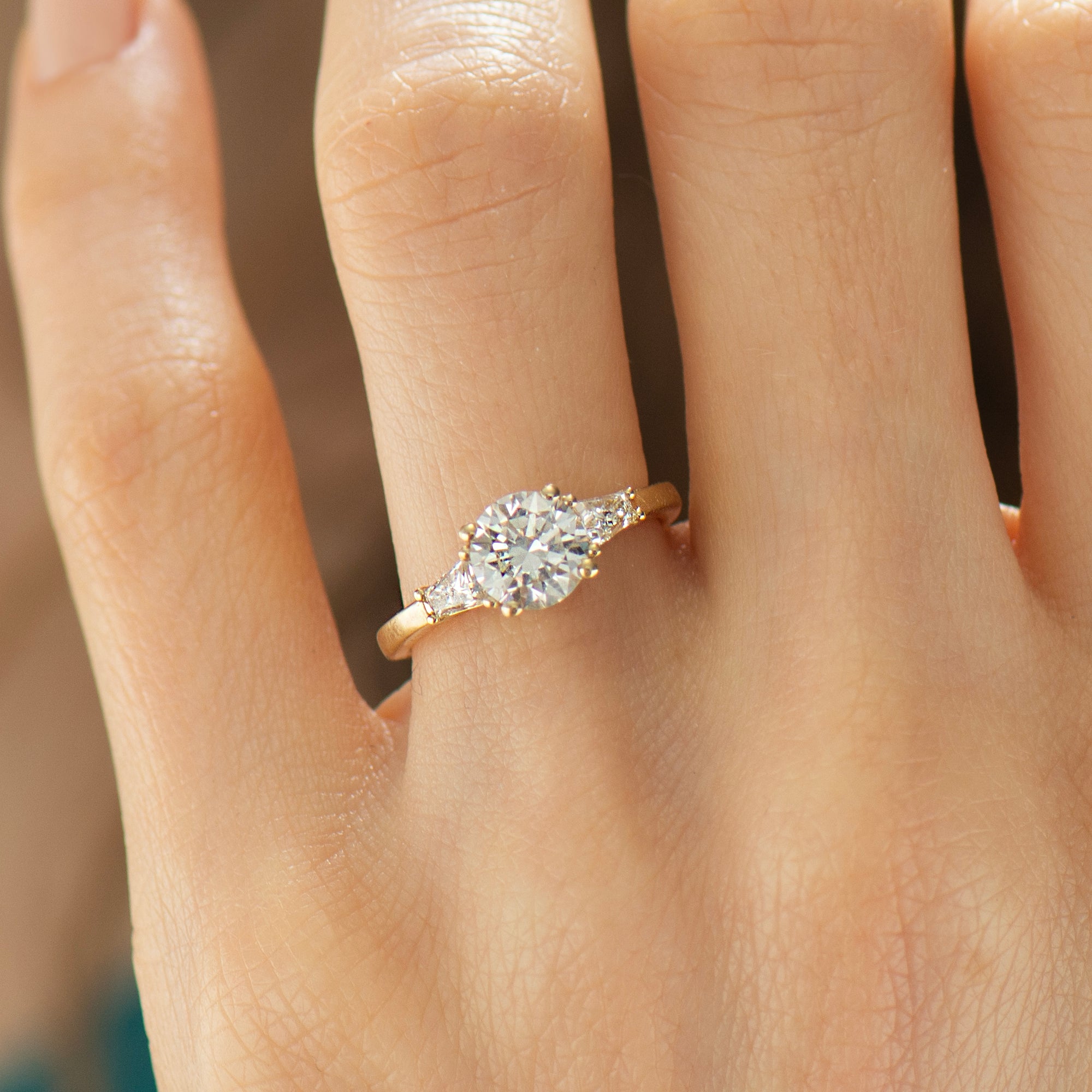 Tapered Princess Side Diamonds Engagement Ring