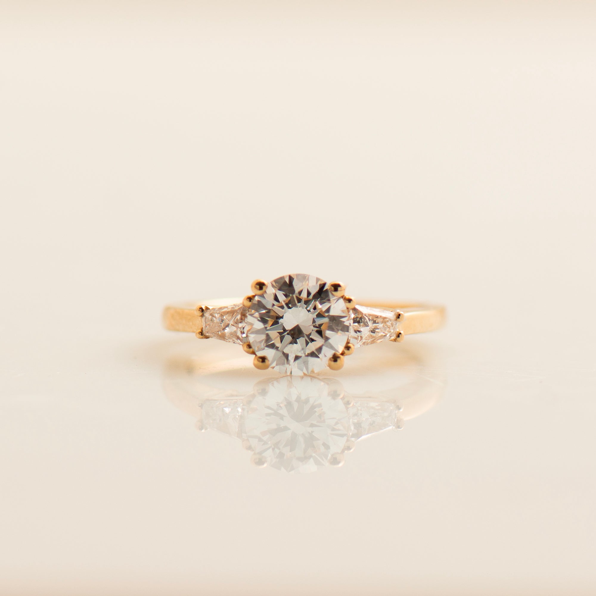 Tapered Princess Side Diamonds Engagement Ring