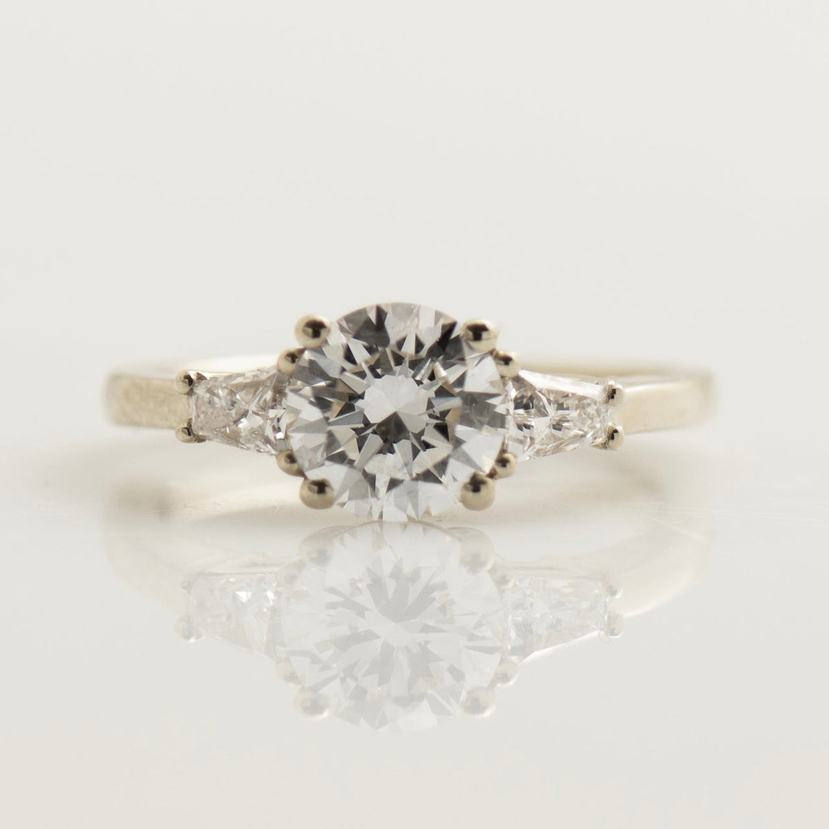 Tapered Princess Diamonds Engagement Ring