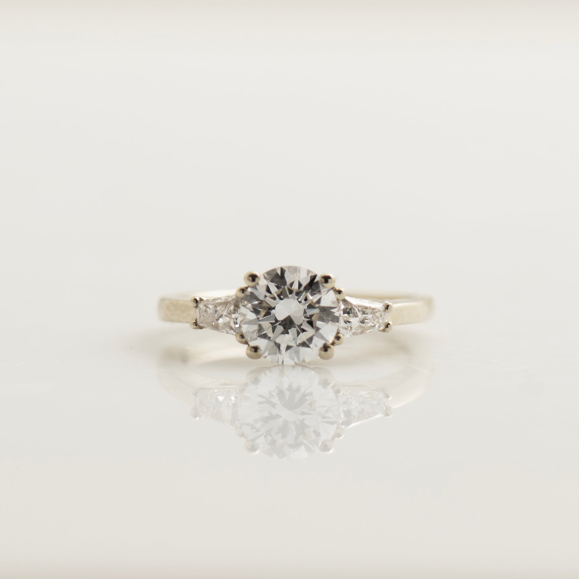 Tapered Princess Side Diamonds Engagement Ring