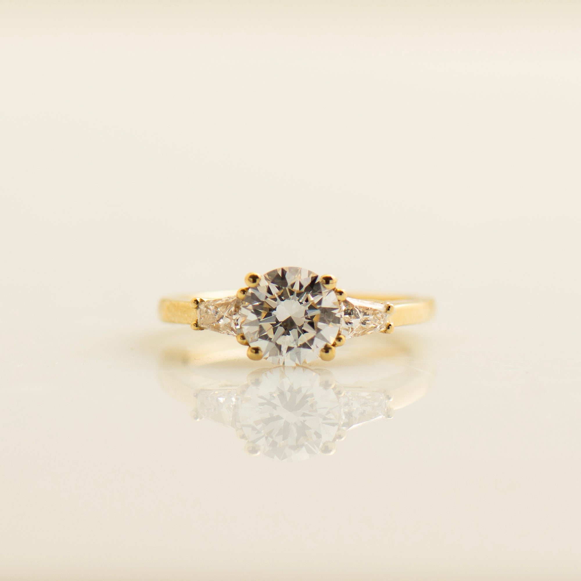 Tapered Princess Side Diamonds Engagement Ring