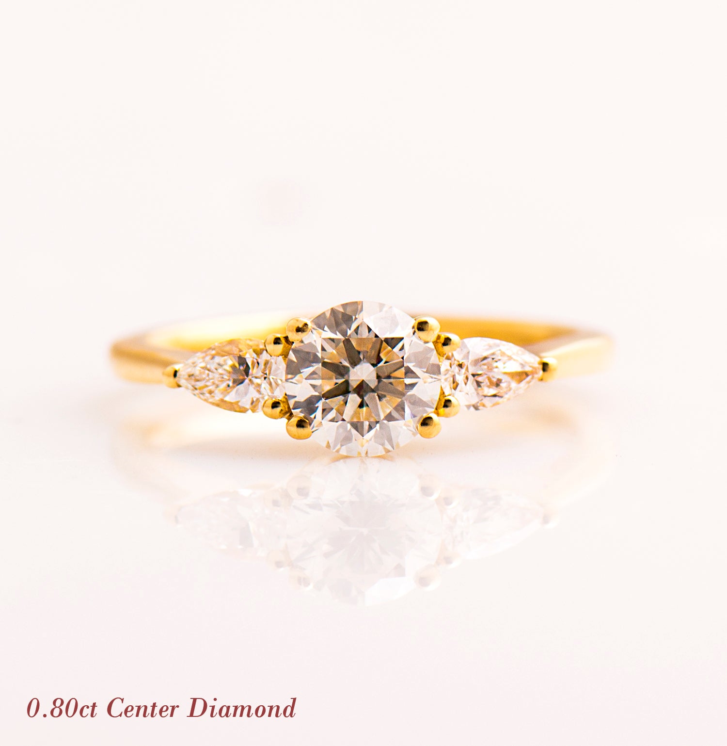 The 3 Stone Ring - Round & Pears