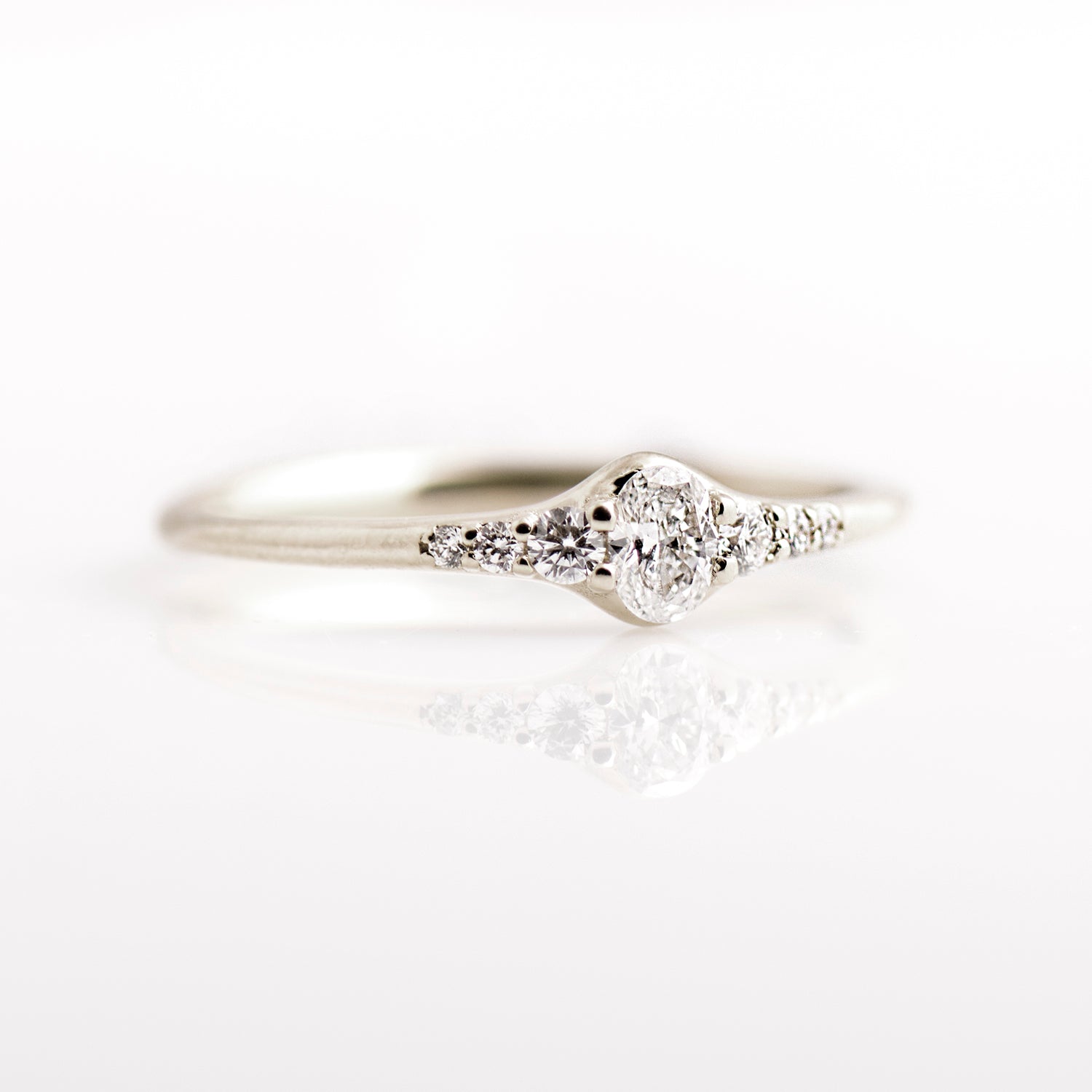 Tiny Oval Diamond Ring