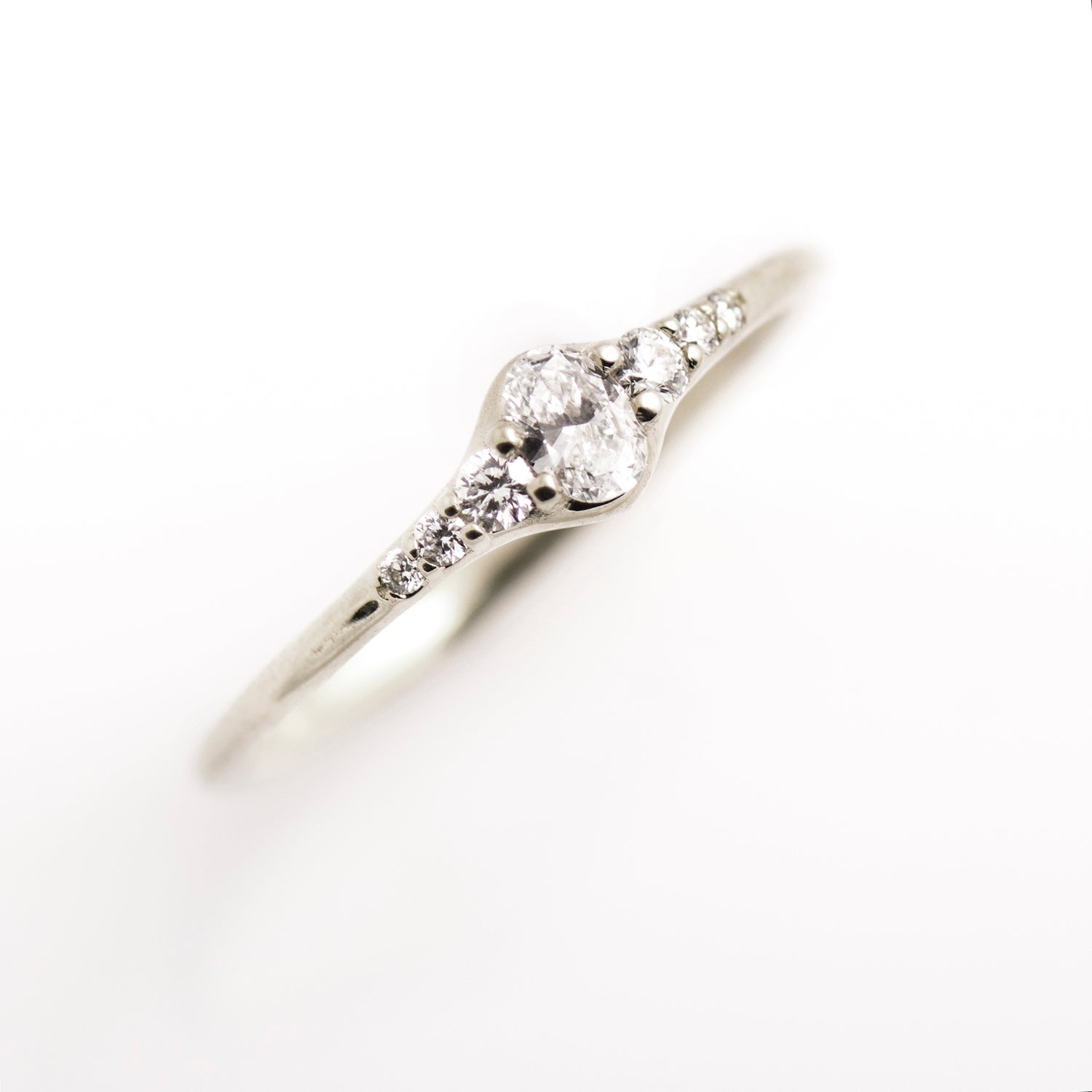 Tiny Oval Diamond Ring