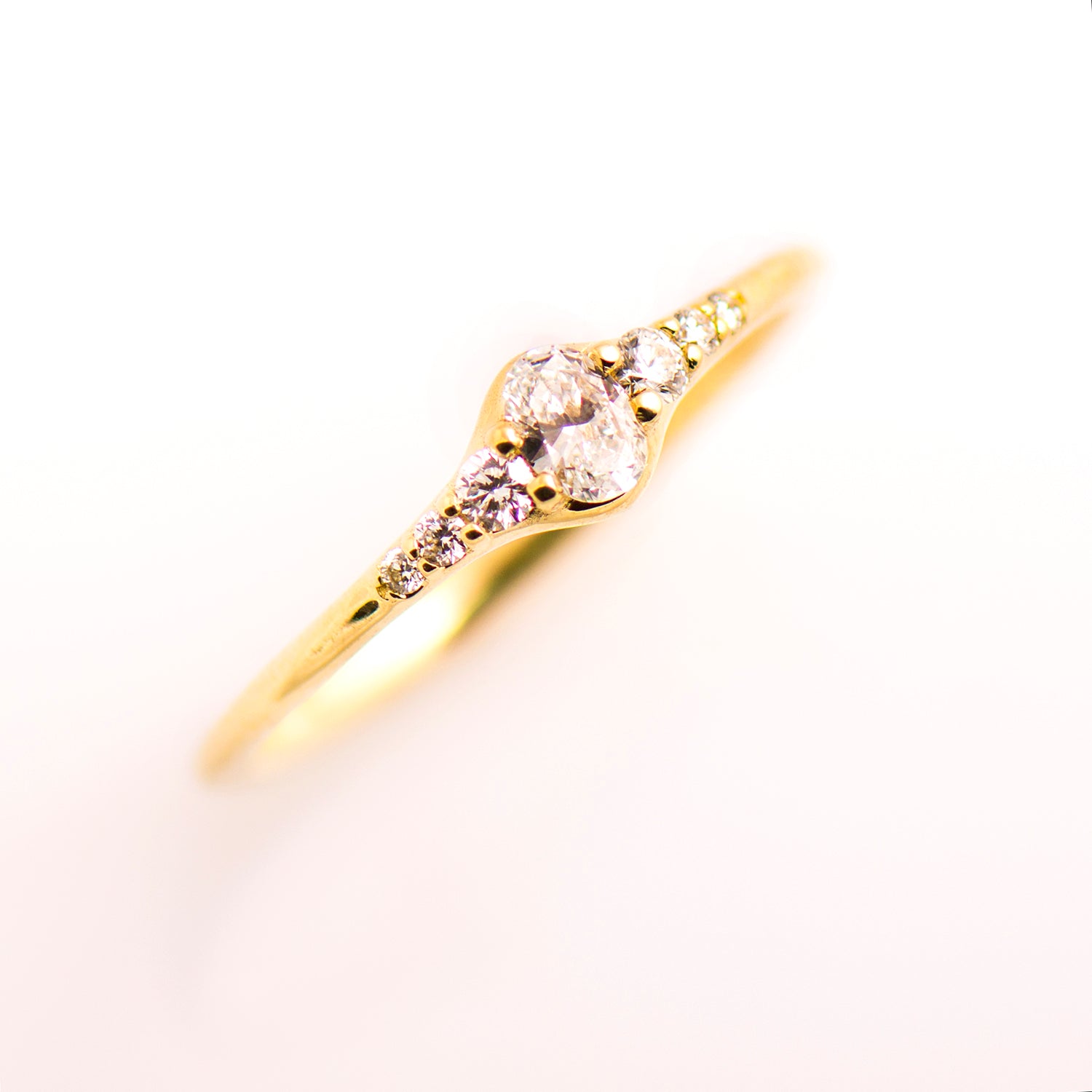 Tiny Oval Diamond Ring