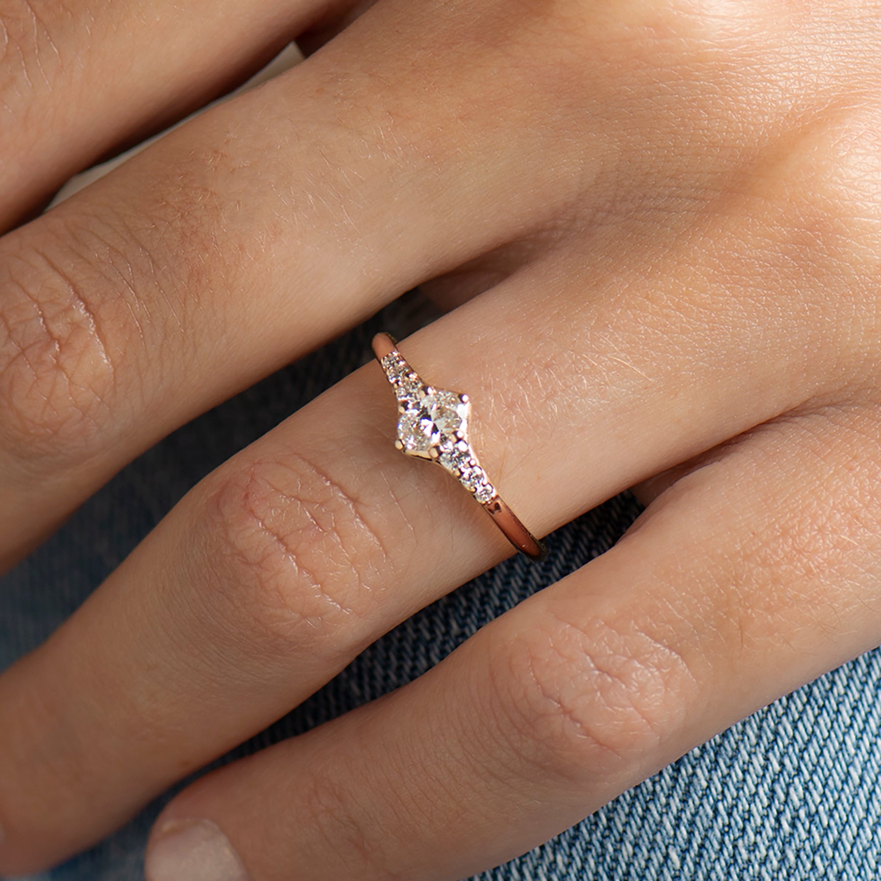 Tapered tiny oval diamond ring