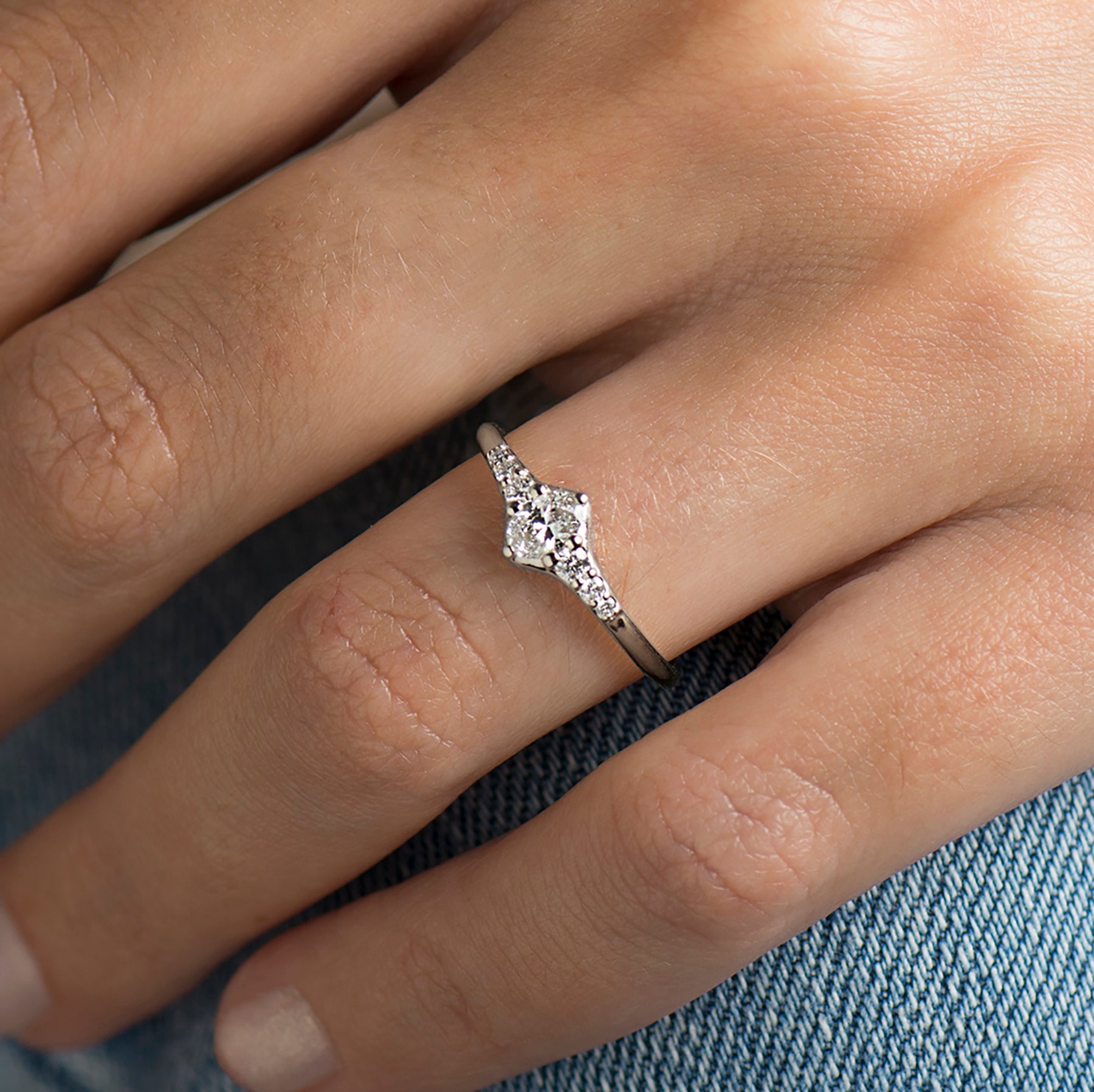 Tapered tiny oval diamond ring