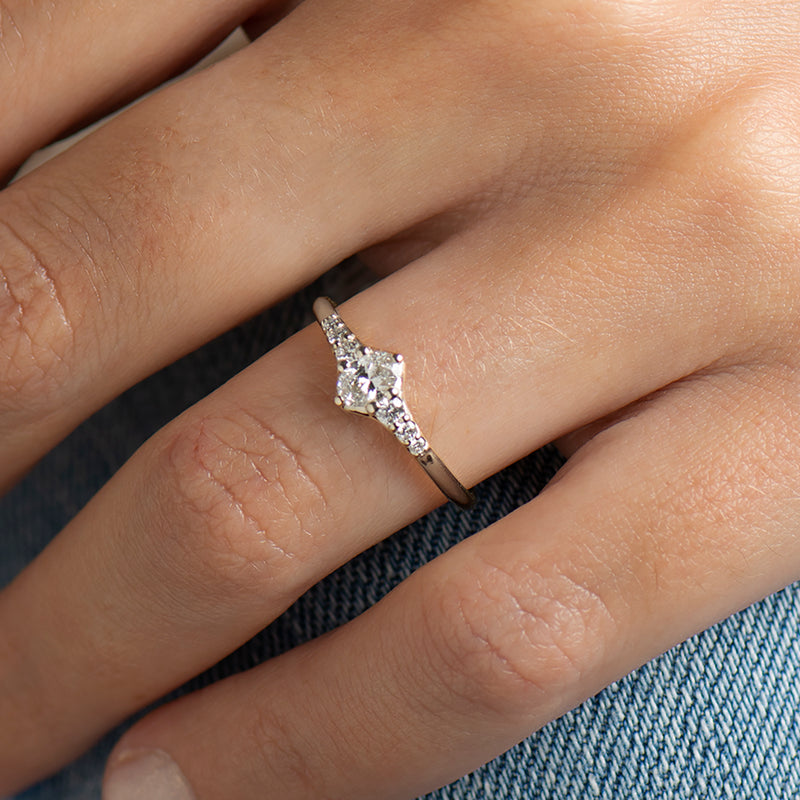 Tapered tiny oval diamond ring