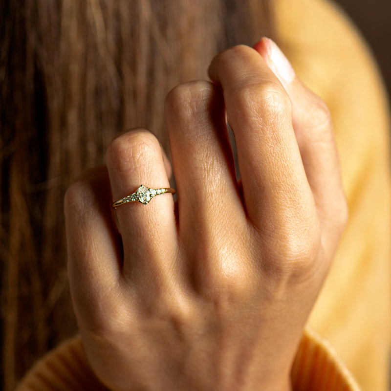 Tapered tiny oval diamond ring