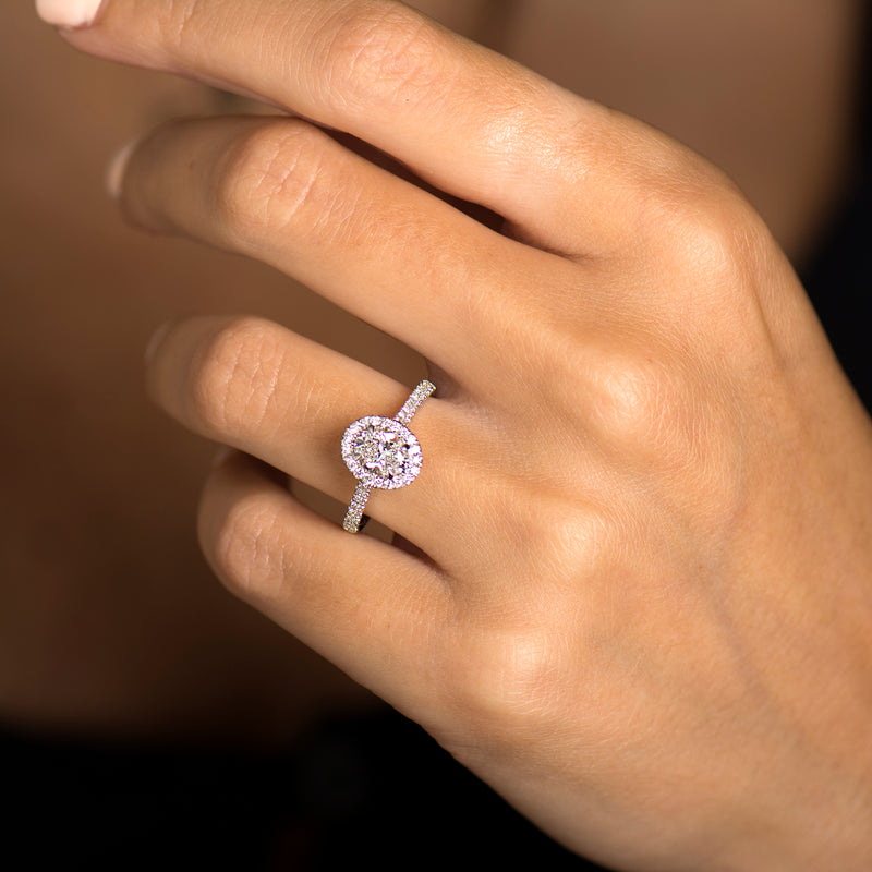 OVAL DIAMOND HALO STYLE SPLIT SHANK ENGAGEMENT RING | Frassanito Jewelers