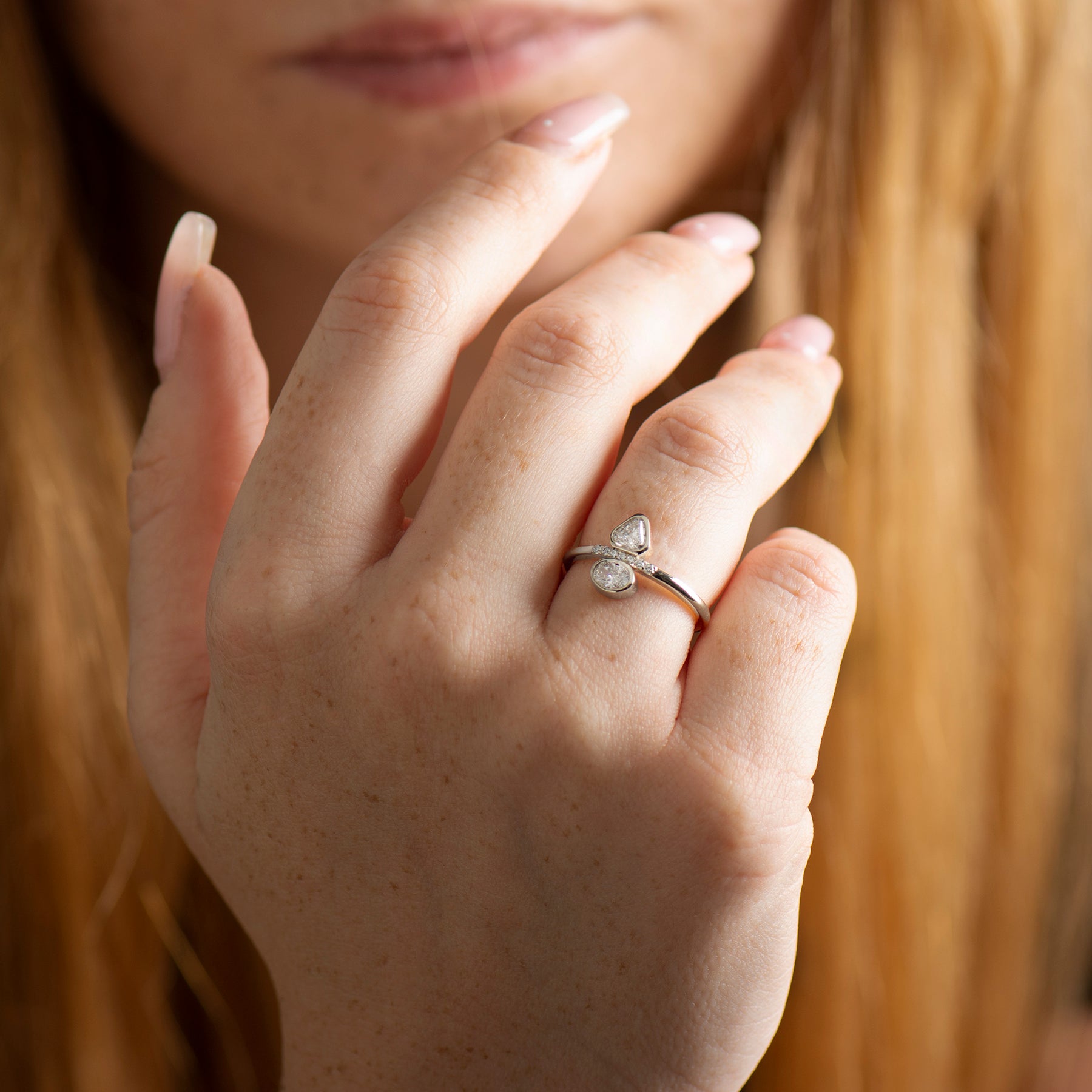 Triangle And Oval Engagement Ring