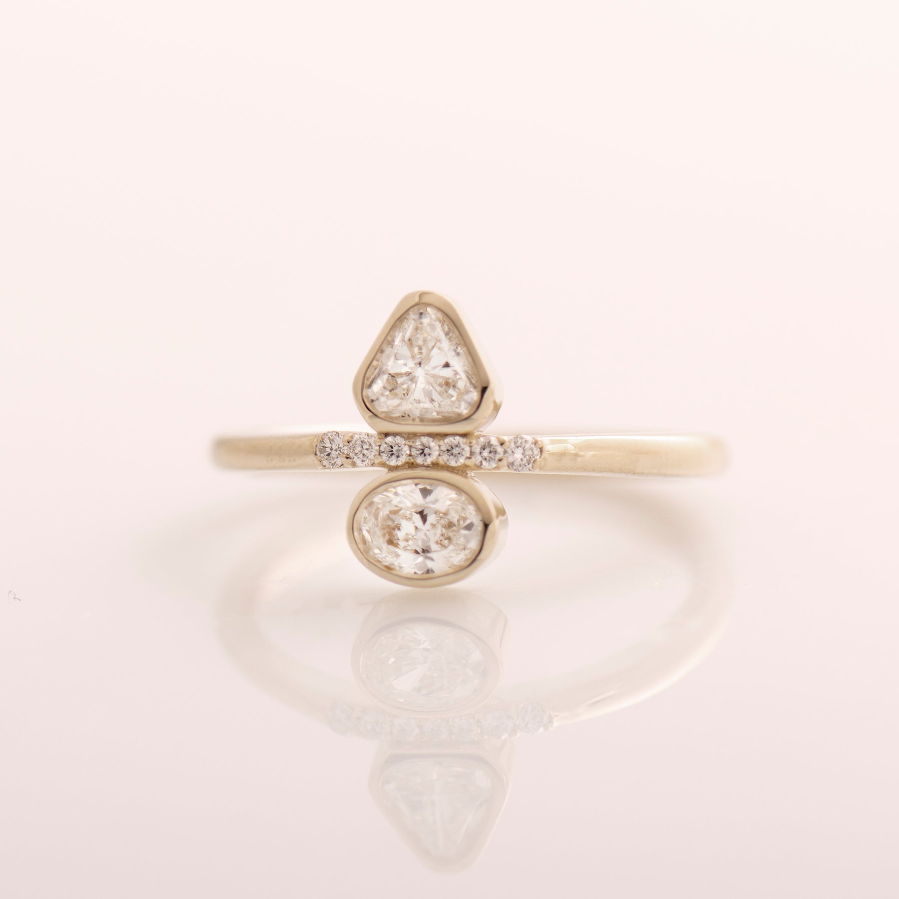 Triangle And Oval Engagement Ring