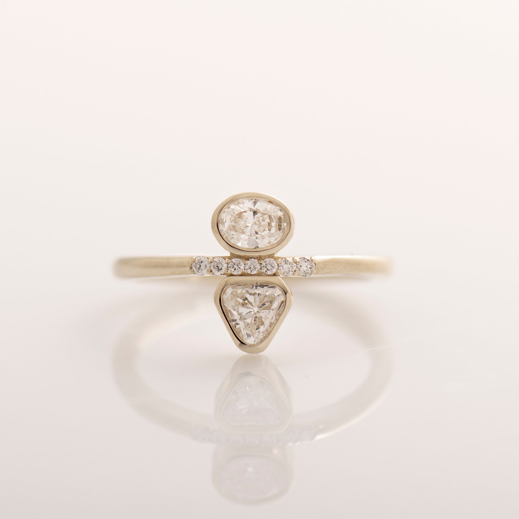 Triangle And Oval Engagement Ring