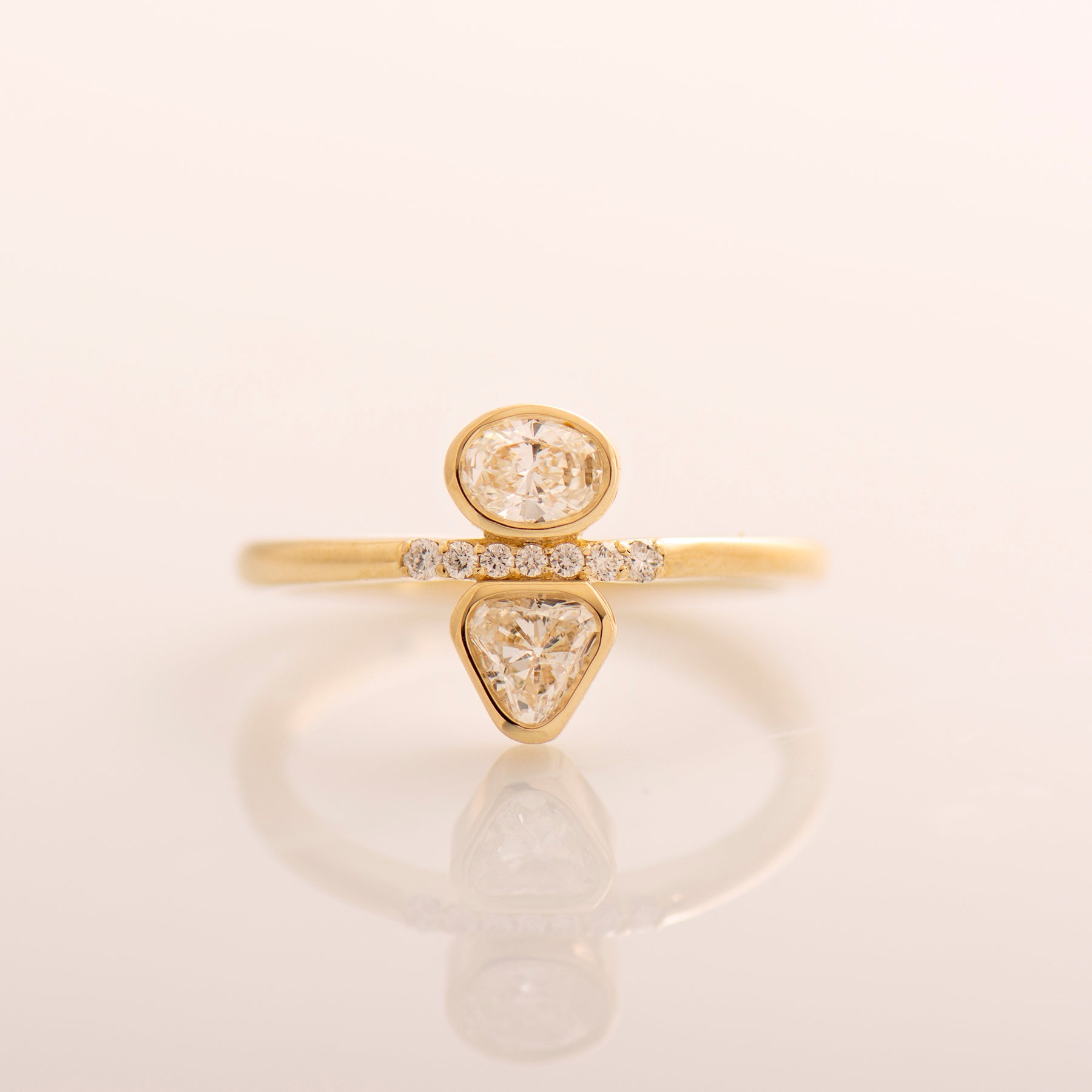 Triangle And Oval Engagement Ring